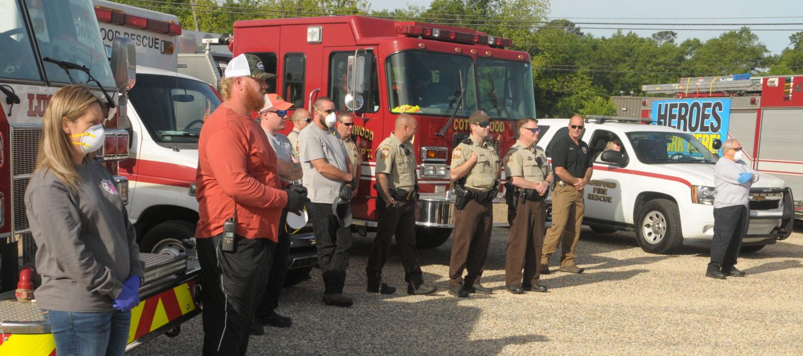 First responders give rolling salute to local health care workers